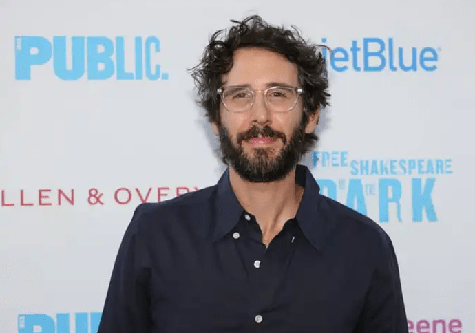 An image of Josh Groban looking happy